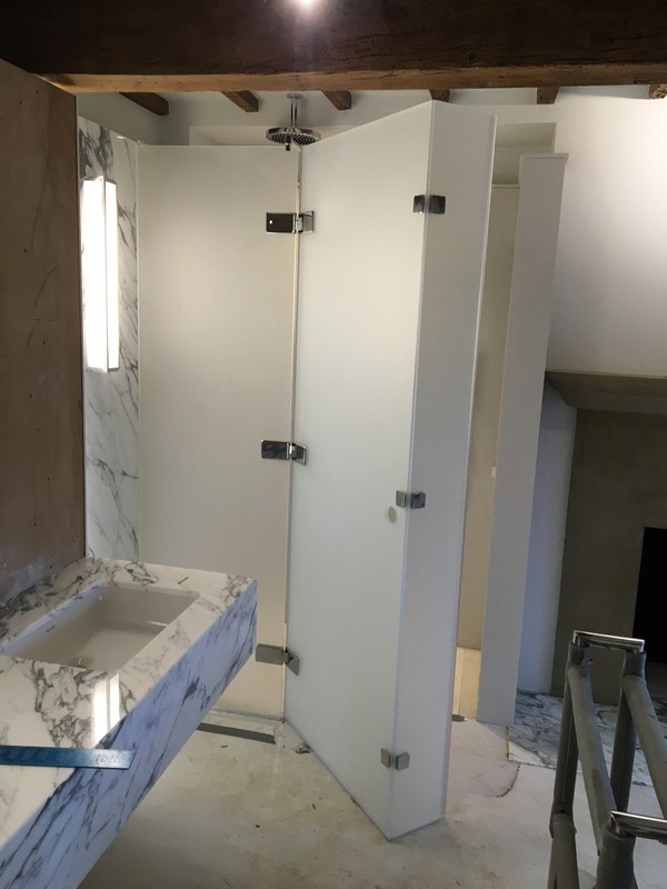 Bespoke frosted glass shower enclosure in West Brompton luxury bathroom